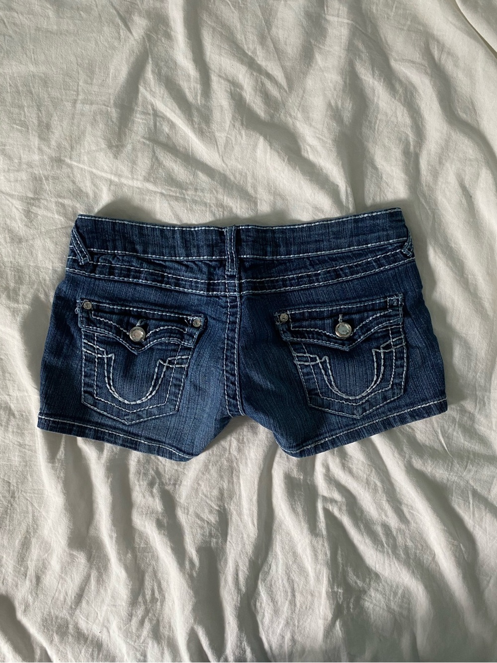 Y2K low rise denim shorts with white contrast stitching